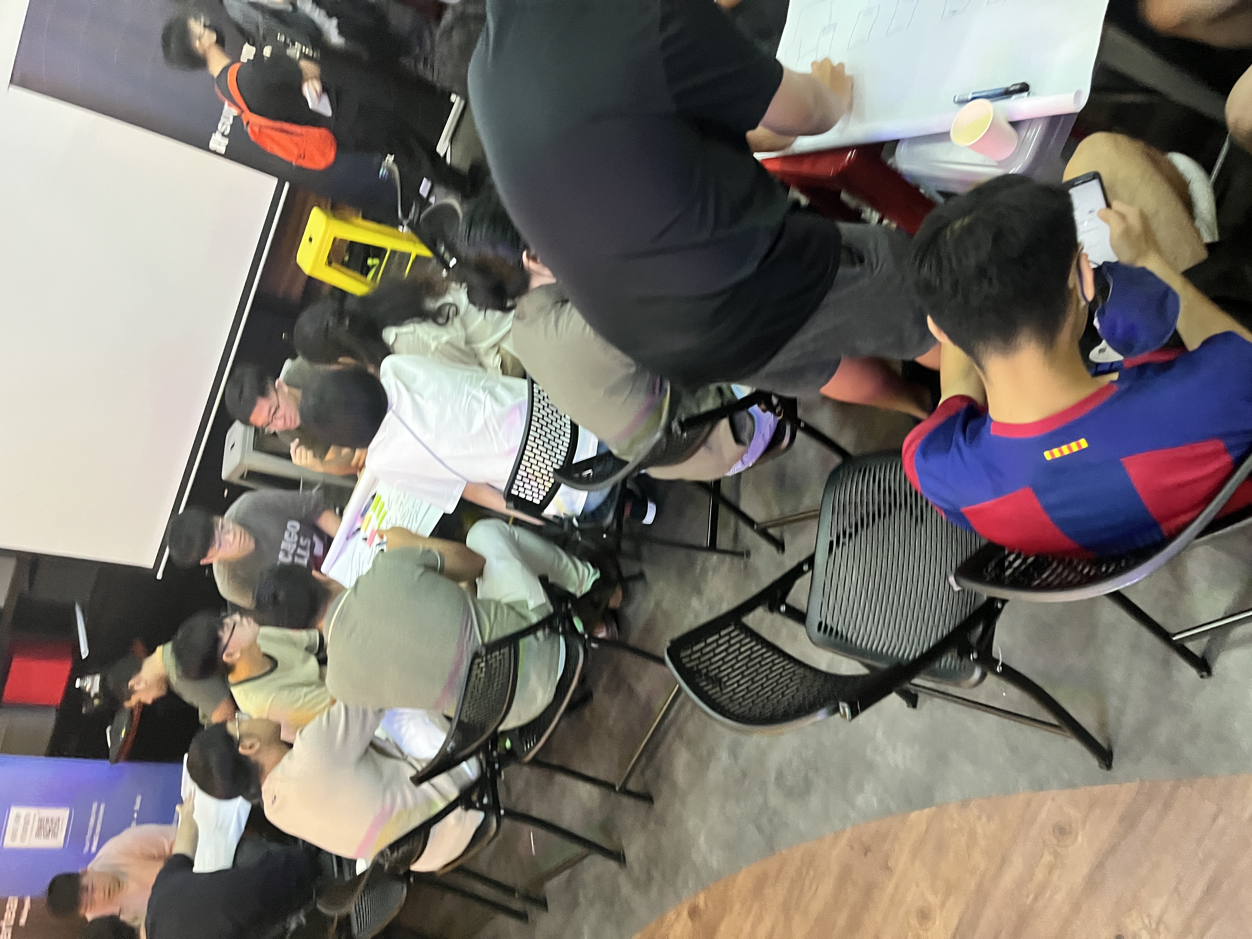 Excellence Academy students collaborating in an exam practice session